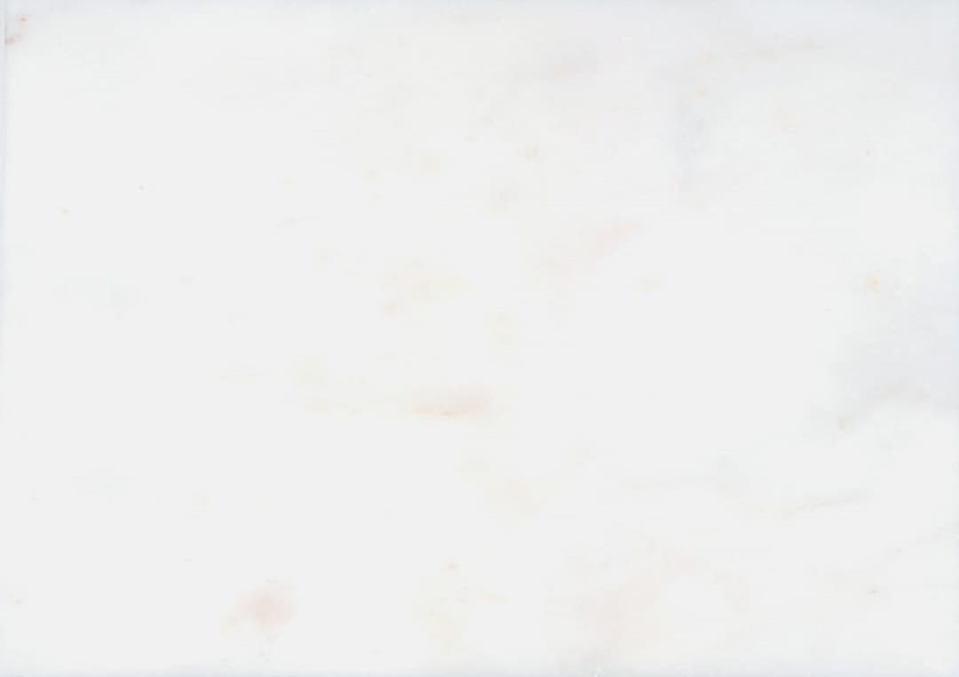 Afyon White vs. Bianco Carrara: Why Pure Calcite Prevents Bathroom Staining